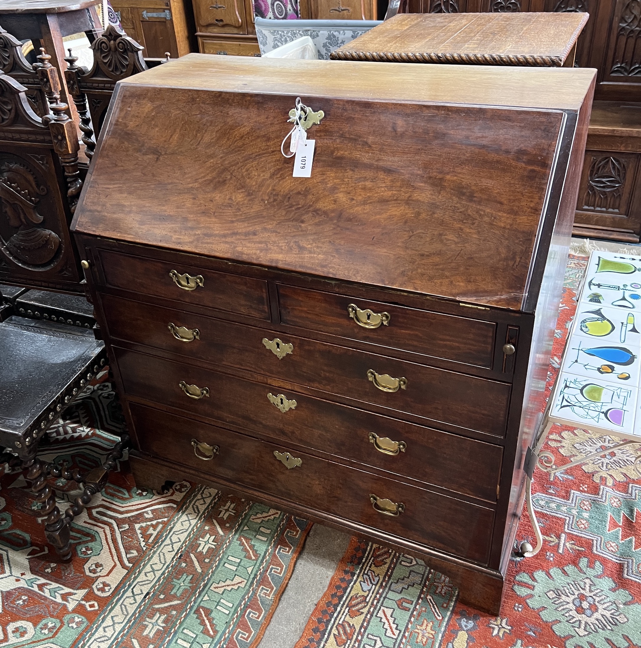 A George III mahogany bureau, width 96cm, depth 54cm, height 104cm.